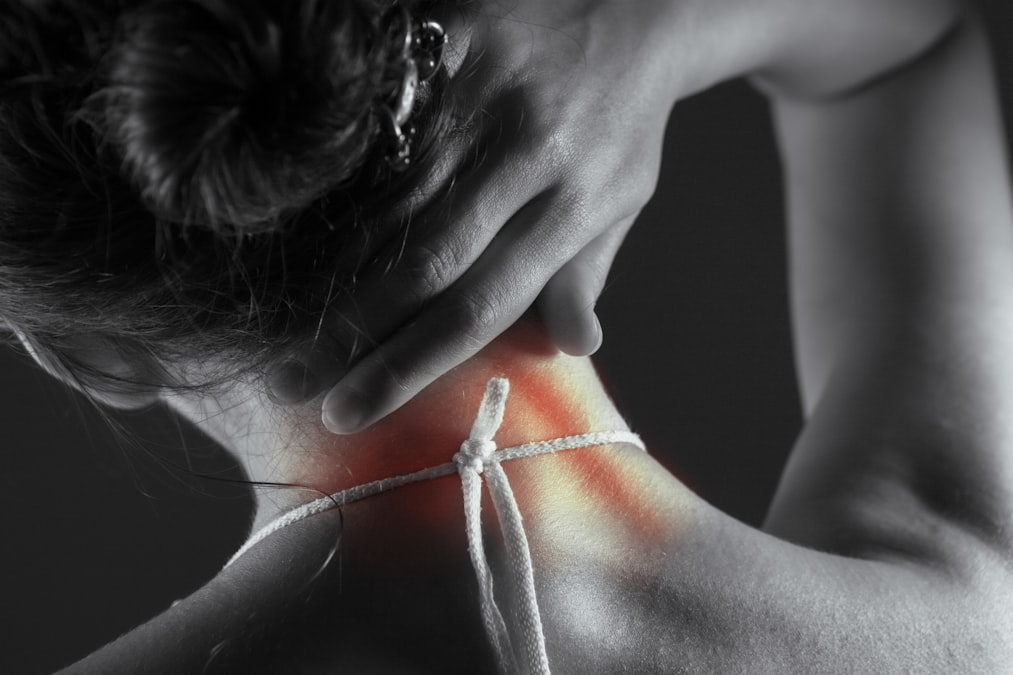 Woman's neck with highlighted pain area