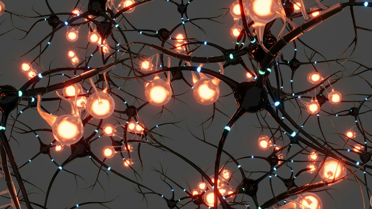 Interconnected dark nerve cells with glowing orange nodes and small blue light pulses