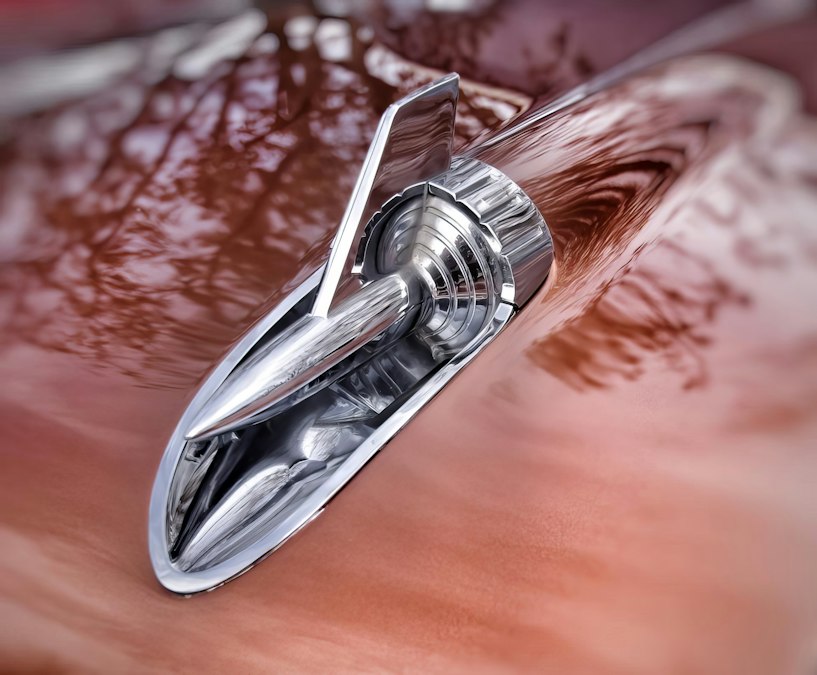 a close up of a shiny metal object